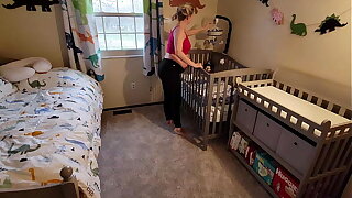 Pregnant Mom gets stuck in crib and son has to come help her get out
